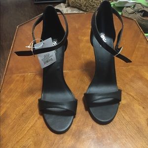 Black strapped heels